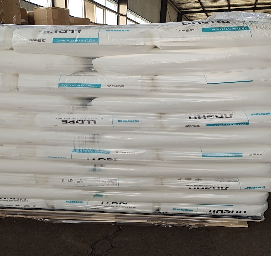 Full-pallet-bulk-stack-of-wrapped-Sibur-Russian-LLDPE-plastic-resin-sacks-warehouse-inventory-shot
